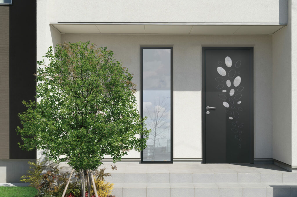 Porte d’entrée vitrée moderne DAHLIA 9 en aluminium sur une façade de maison moderne